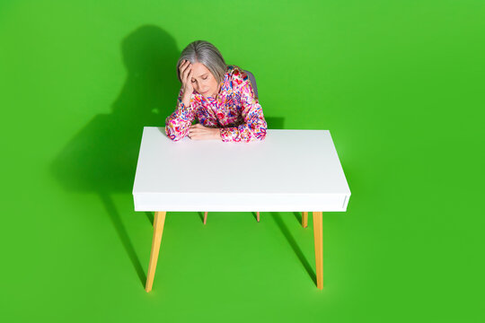 Full length top view photo of tired sad lady dressed blouse feeling tired isolated green color background