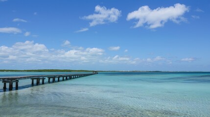 Obraz premium Tropical Paradise with Wooden Jetty