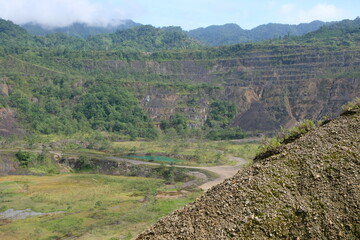 Fototapeta na wymiar Aerial view of Panguna Copper and Gold Mine pit landscape in Bougainville, Papua New Guinea