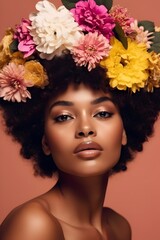 Obraz na płótnie Canvas Beautiful woman with an afro hairstyle, adorned with a vibrant array of flowers, adding a touch of natural beauty and elegance to her look. Concept: connection with nature, femininity.