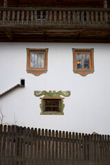 tyrolean alpine hut with fence