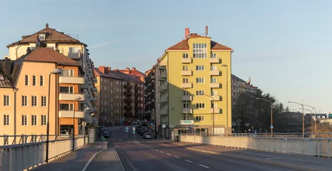 Fototapete Rund Apartment houses on the island Lilla Essingen, bridge and bus stops, an early sunny morning in Stockholm © Hans Baath