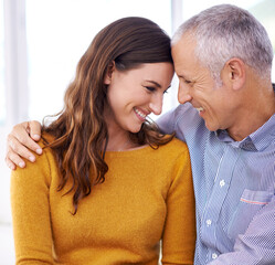 Couple, laughing and hug in home for love with support, funny joke and comfort in living room of...