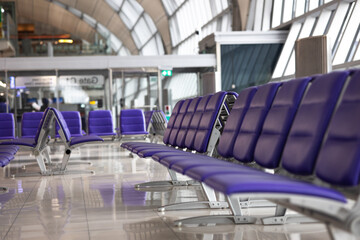 purple seats in airport lounge
