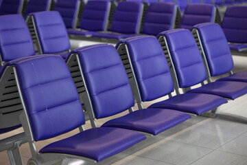 Obraz premium purple seats in airport lounge