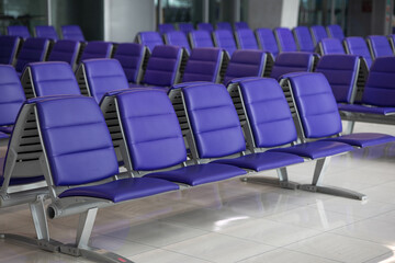 purple seats in airport lounge