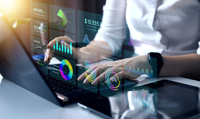 KPI Dashboard on virtual screen. Businessman analysing finance data graph on stock market....