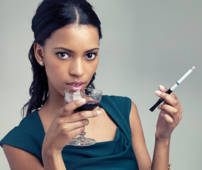 Woman, studio and portrait with wine, cigarette and fashion with luxury class and proud. Model,...