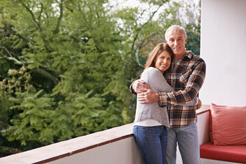 Senior couple, hug and portrait on balcony with happy, love and outdoor with connection for retirement. Woman, elderly man and embrace on patio with pride, care and smile at apartment in Germany