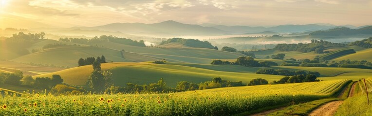 The image shows the sun shining brightly over the rolling hills in a serene landscape. The hills are lush green, and the suns rays create a beautiful contrast with the shadows.