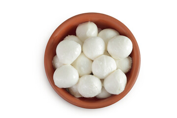 Mini mozzarella balls in a ceramic bowl isolated on white background with full depth of field. Top view. Flat lay.