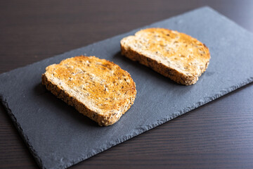 toast bread slice on dark background