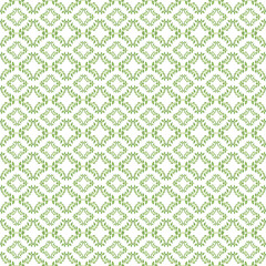 Hand-drawn watercolor illustration. Seamless pattern with green leaves and branches. Geometric pattern for background