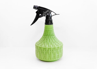 Plastic spray bottle on white background.