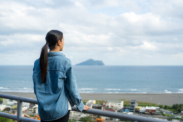Tourist woman look at the Guishan island In Yilan of Taiwan - 762413223