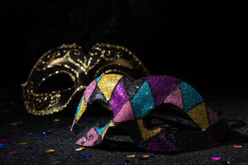 Carnival Party. Venetian Masquerade masks on black background.