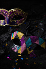 Carnival Party. Venetian Masquerade masks on black background.