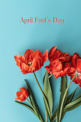 Colorful funny humorous postcards banner for April Fools' Day, April 1, the day of jokes and laughter. With the inscription "April Fool's Day". Red tulips on a blue background. Discount and sale