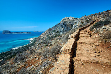 Fototapeta na wymiar rocky hiking trail in the mountains above the Balos Lagoon on the island of Crete