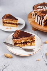 Snickers cake with caramel, peanuts and buttercream.