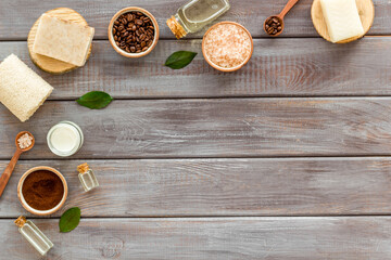 Obraz na płótnie Canvas Organic care cosmetics set with coffee scrub and sea salt, top view