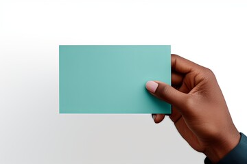 A hand holding a turquoise paper isolated on white background, elements, crisp and clean lines