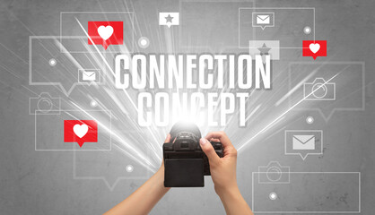 Close-up of a hand taking photos