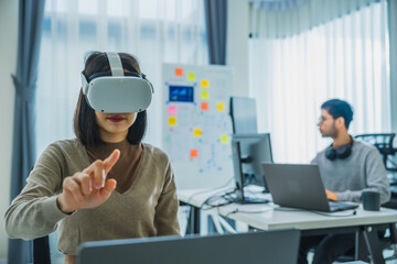 Asian and Indian developer program coding sent to virtual reality headset to implement ai project at office - 762431466