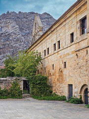 Facade of the monastery of Santa Maria la Real in Aguilar de Campoo, province of Palencia - 762453489