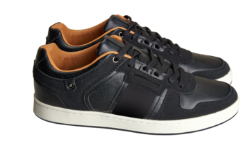 A pair of black leather shoes view from side.