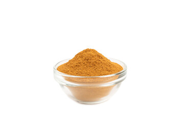 Obraz na płótnie Canvas Cinnamon powder in a bowl isolated on white background. Spicy spice for baking, desserts and drinks. Fragrant ground cinnamon.