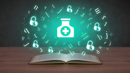 Open medical book with health icons above - 762457433