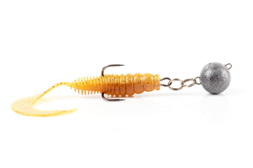 Soft fishing bait, silicone grub, with double hook and lead sinker, isolated on white
