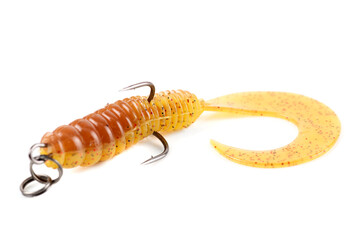 Yellow silicone grub, fishing lure with double hook, isolated on white