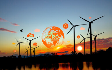 Carbon Neutrality and Net Zero concept. green net center icon in hand, sunset background