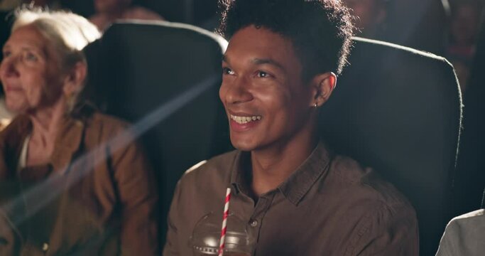 Man, audience and cinema with laugh for comedy in movie for fun, enjoy and joke for entertainment. People, crowd and theatre for premier or watch show with drama, action and happy with film