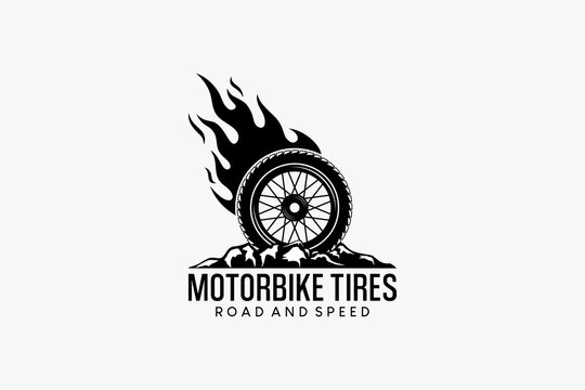 Vector illustration of a motorbike tire logo with fire on rocky ground. Automotive logo