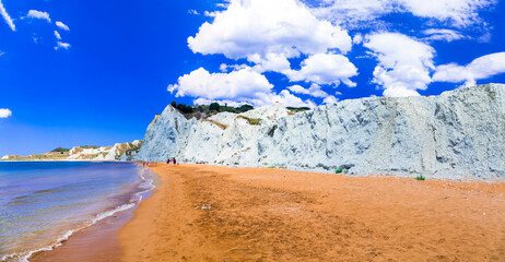 Best scenic beaches of Cephalonia (Kefalonia) island - colorful orange Xi beach. Ionian islands of Greece - 762472824