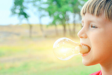 A light bulb glows in a person, a child holds a lighting device