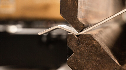 Metal stainless sheet bending on hydraulic machine.  bending stainless sheet. 