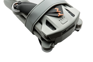 drone folded up (small recreational aircraft quad copter that shoots 4k video) isolated on white background (close up, macro, cut out)