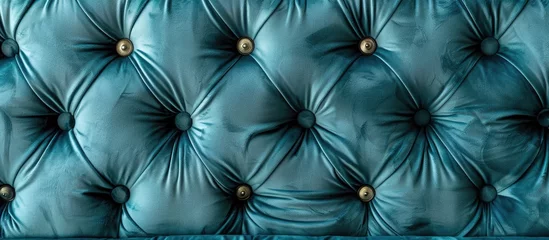 Poster A closeup of a tufted couch resembling a cloud on a sunny day, with vibrant blue fabric and elegant gold buttons, reminiscent of the azure sky reflecting in water © 2rogan