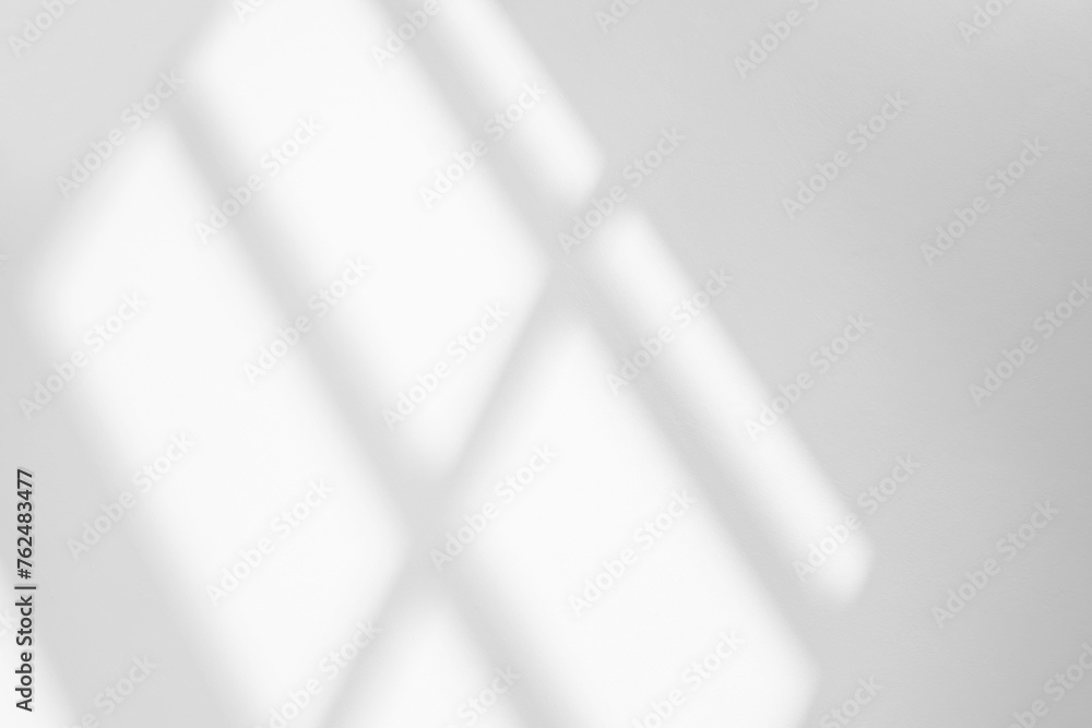 Poster abstract light reflection and grey shadow from window on white wall background, dark gray shadows an