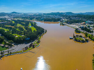Fototapeta premium Aerial View of Tuyen Lam Lake in Dalat, Vietnam, with Urban and Natural Landscapes