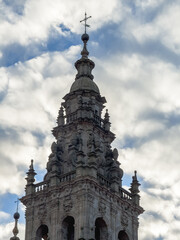 Twilight Silhouette of a Baroque Tower Against a Cloudy Sky