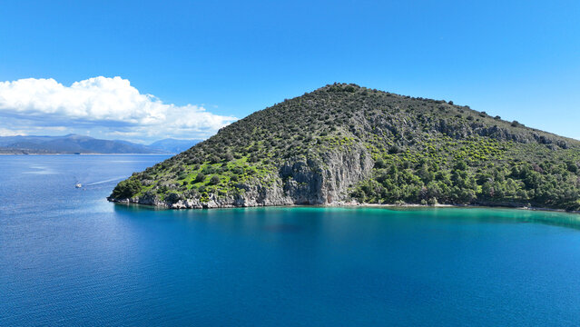 Aerial drone photo of small exotic island of Romvi next to famous long beach of Tolo, Argolida, Peloponnese, Greece