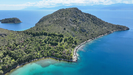 Aerial drone photo of small exotic island of Romvi next to famous long beach of Tolo, Argolida, Peloponnese, Greece
