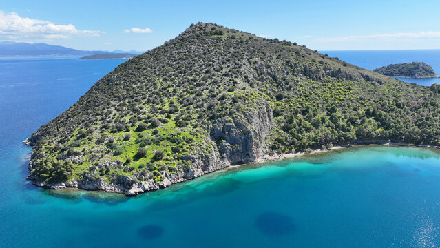 Aerial drone photo of small exotic island of Romvi next to famous long beach of Tolo, Argolida, Peloponnese, Greece