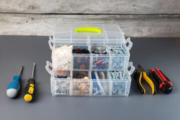 Plastic box with accessories and tools