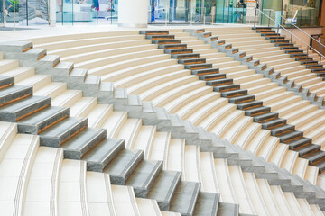 Fototapeta premium Modern Empty Long stair concrete in office building,Stairs from underground upward,Horizontal view of stairs in airport.
